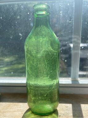 1960’s Green Embossed 7up Glass Bottle